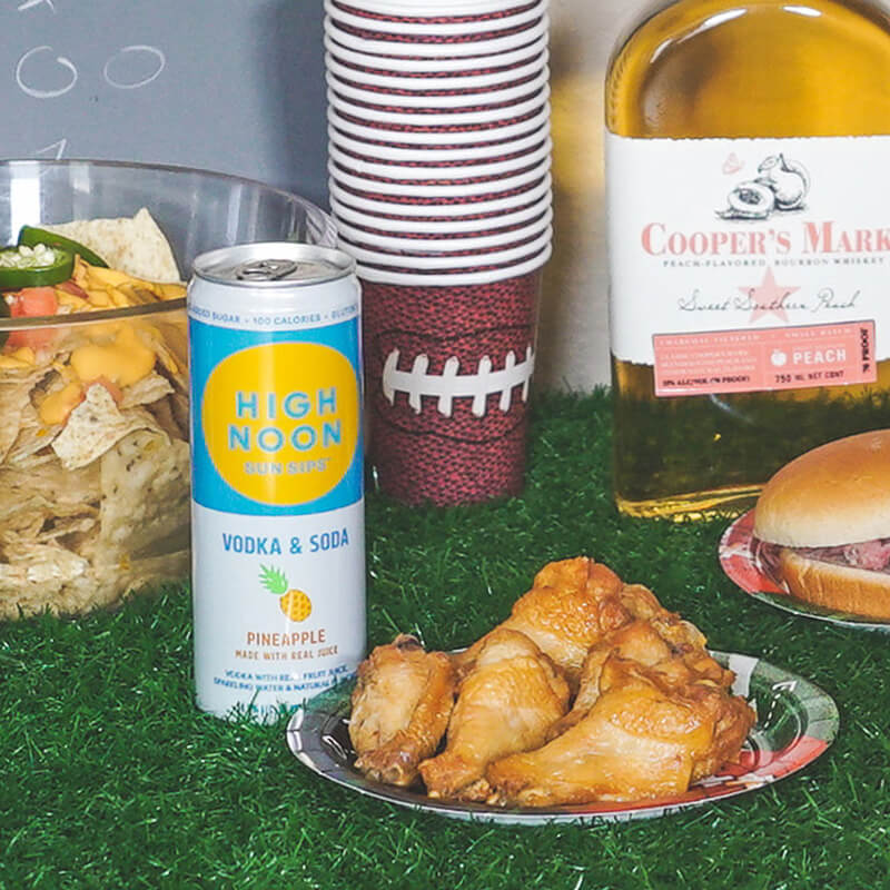 High Noon Sun Sips with chicken wings for game day