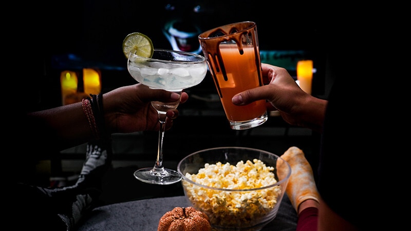 Horror movie and cocktails for Halloween.
