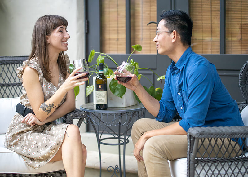 Couple drinking wine together.